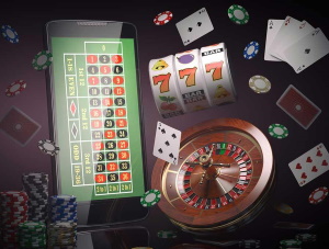 Smartphone med roulettbord, slotshjul, spelkort, spelmarker och rouletthjul